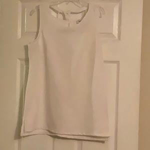 White House Black Market sleeveless white top.